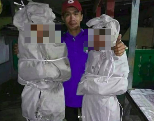 Niat ngeprank, pocong gadungan ditangkap warga disuruh tidur di kuburan